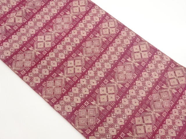 横段に四ツ菱・矢羽・亀甲模様織出し名古屋帯